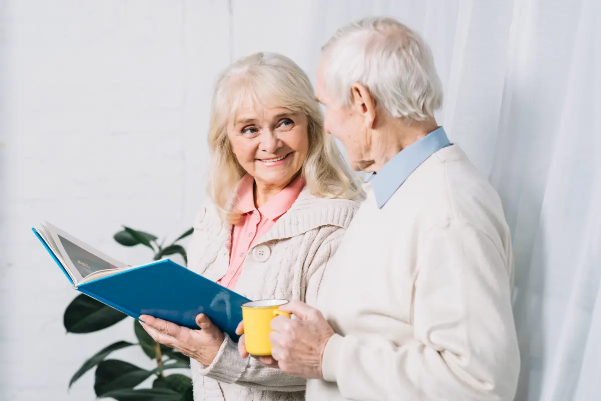 senior couple reading inside nursing home brisbane